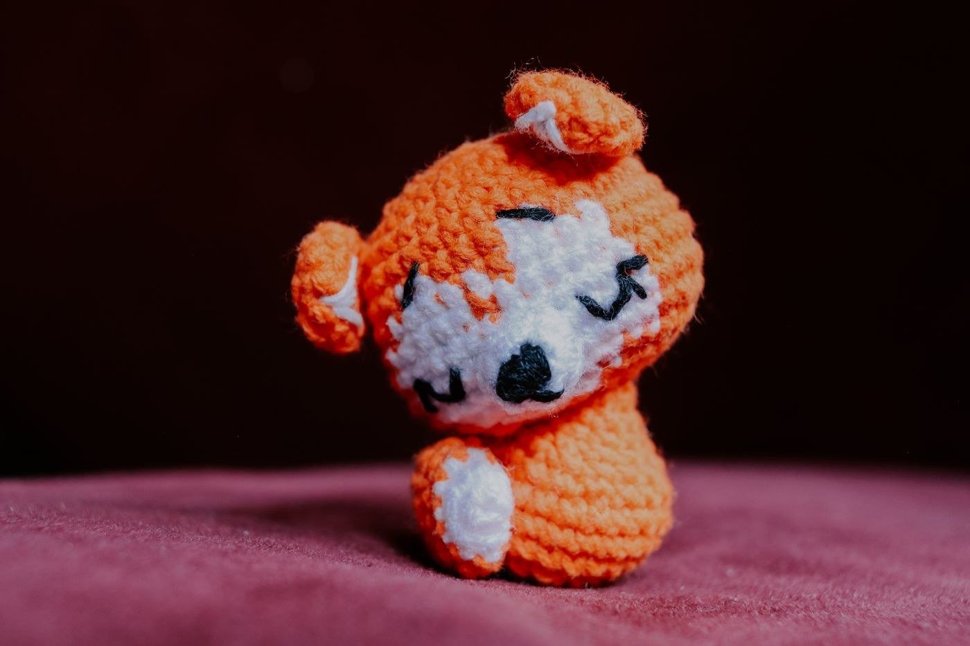 Handmade orange crochet amigurumi animal